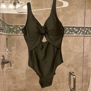 DKNY one piece NWT key hole swimsuit dark olive green color.